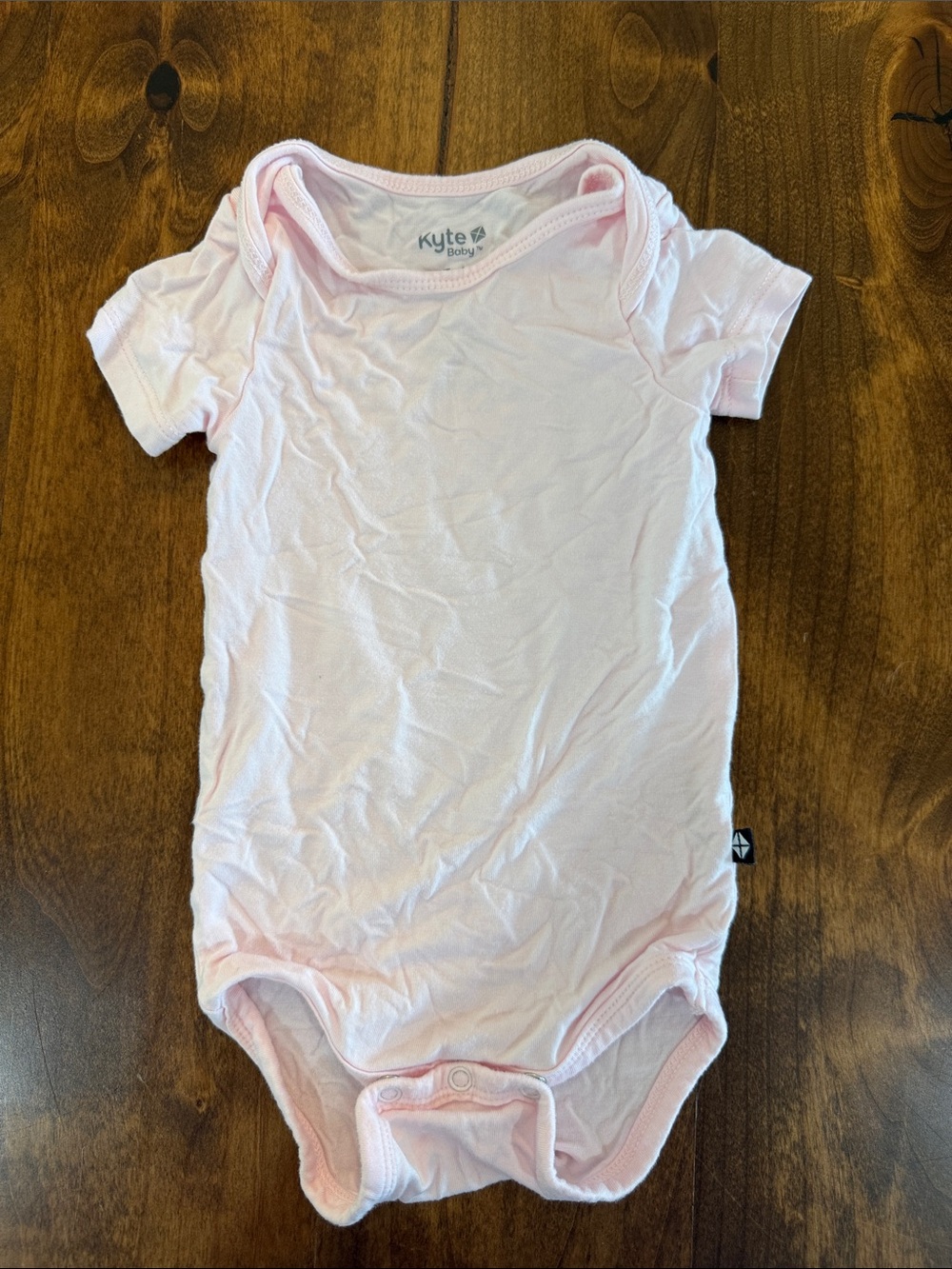 Kyte BABY Light Pink Short Sleeve One-Piece Bodysuit